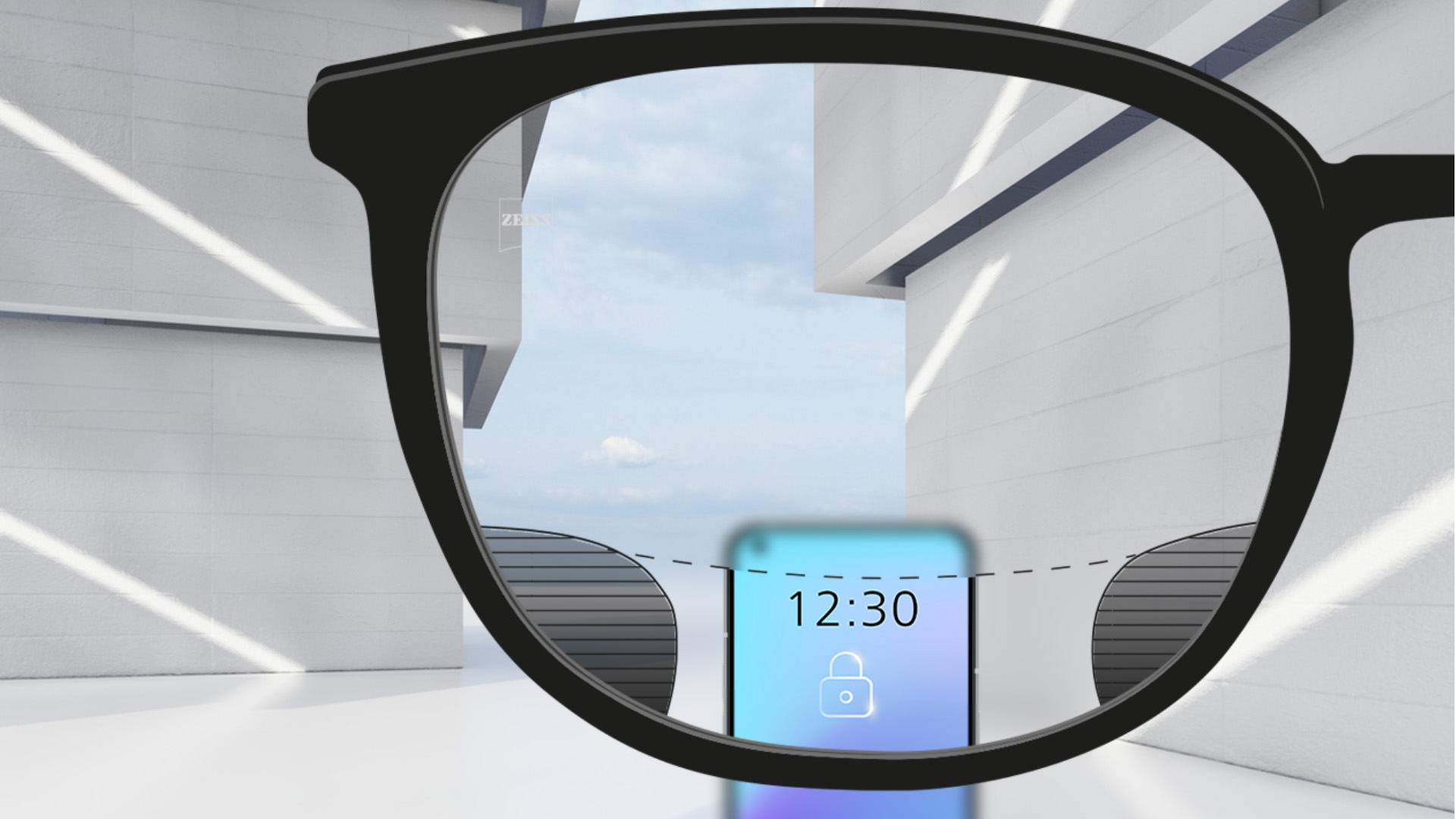 Akıllı telefonla ZEISS Digital SmartLife lensleri kullanılarak çekilmiş bir bakış açısı görüntüsü ve lensin üst ve alt kısmının tamamen şeffaf, sağ ve solda küçük bulanık çizimlere sahip olması.